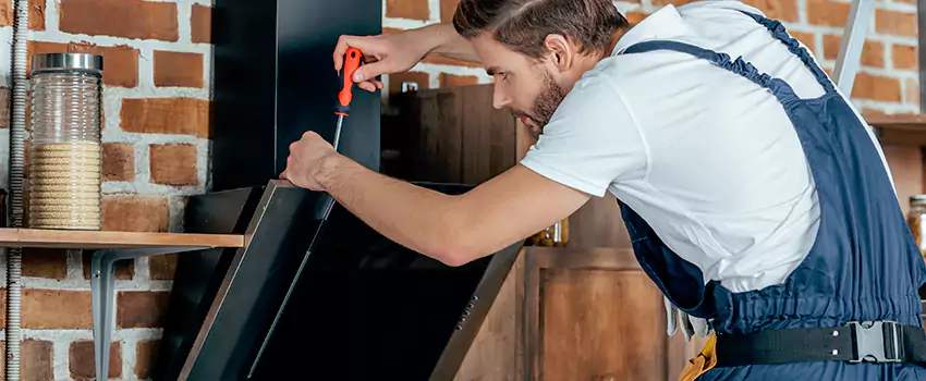 Old Rusted Metal Fireplace Repair And Replacement in Whitehorse, YT